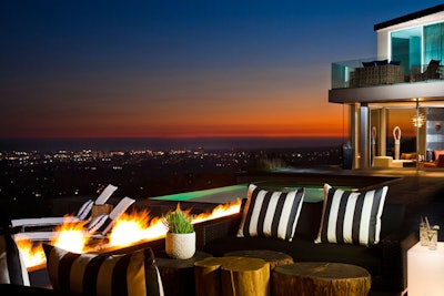 Don Q's terrace overlooks the city with sweeping views.