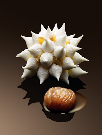 For the Hotel Plaza Athénée Paris's new winter menu, head pastry chef Christophe Michalak created 'Chestnut,' a rum baba with vanilla chantilly cream, spiky points of meringue, and chestnut Bavarian cream.
