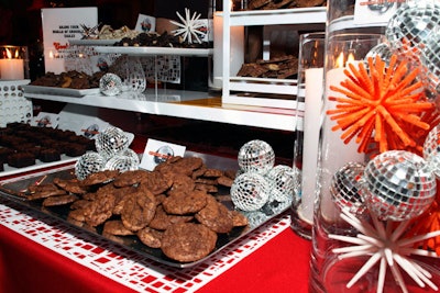 Lincoln Park bakery the Cookie Bar provided its signature treats. Tabletop decor mimicked the mod, disco ball-flecked interior of the bakery.