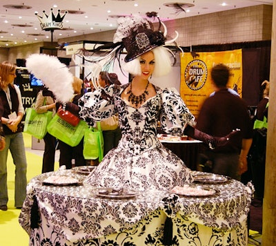 A Lady Gaga-themed walking table from Screaming Queens Entertainment wowed attendees as it moved through the expo floor.