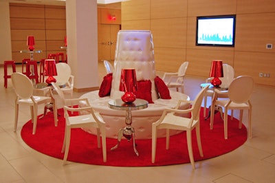 Red and white furnishings from Contemporary Furniture Rentals filled the reception space.