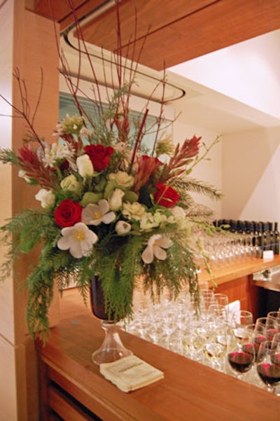 A floral arrangement from San Remo Florist Inc. topped the bar.