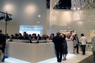A media reception and press conference was held in the Art Basel collectors lounge on Wednesday, hosted by the fair's organizers. Centerplate served passed hors d'oeuvres and sponsor Ruinart offered complimentary champagne. The 33,000-square-foot lounge is housed within the Miami Beach Convention Center's D hall, with furniture by Moroso.