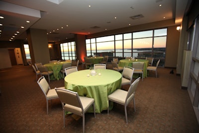 The Westin Tampa Bay provides 60-inch rounds with sage linens and flameless candles.