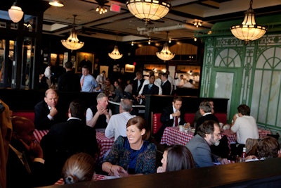 With its high tin ceilings, stained oak walls, and period lighting, the main dining room at the P.J. Clarke's evokes the 1940s.