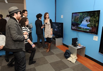 Upstairs in the living-room-style area, the pop-up shows off some of the latest HDTVs and other home entertainment products.