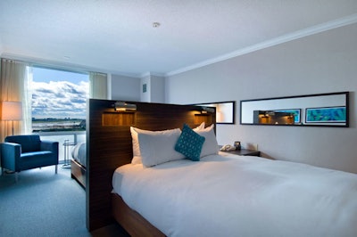 Suites include uniquely designed back-to-back beds, each with personal wall-mounted flat-screen televisions.