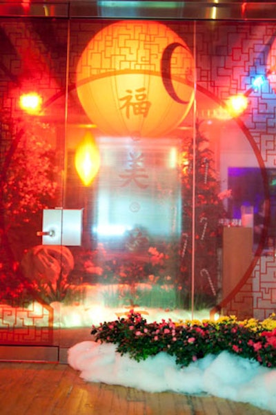 Pallattella used opaque decals to create the image of a Chinese moon gate on the entrance to the Capital C offices.
