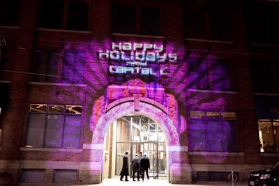 Event planner Mary Pallattella called on the Media Merchants to light up the exterior of the Capital C building on King Street East with 3-D projections of swimming goldfish and a holiday greeting.