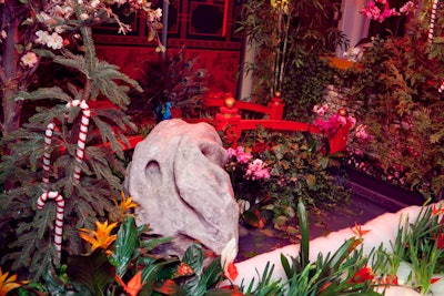 Event organizers scattered red origami cranes around the venue and throughout the moon gate garden, which included a pond and a red bridge with the Capital C logo displayed on the posts.