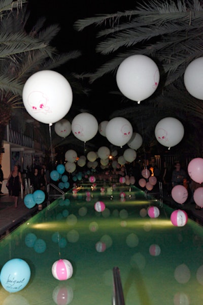 New York-born, Miami-based artist Miguel Paredes presented his largest exhibition at the National hotel during Art Basel. His artwork was featured in the hotel's Oval Room and along the indoor columns and walls. Paredes also draped two 80-foot banners down the hotel's facade and hovered about 30 balloons featuring his character Pulgha over the pool. More than 1,000 guests attended the opening reception on Wednesday, which featured cocktails by Bombay Sapphire, music by Buddha Bar resident Sam Popat, and the work of Paredes collaborator and rock photographer Danny Clinch.