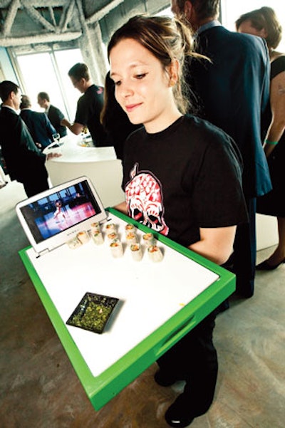 At the Institute of Contemporary Art's May gala in Boston, servers passed hors d'oeuvres on trays with mini screens that displayed work from the museum's teen programs.