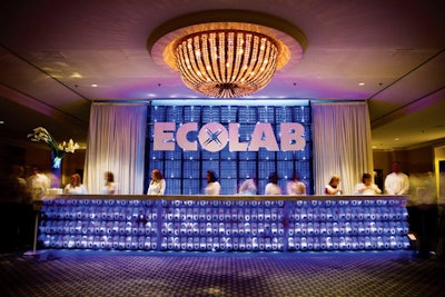 At Ecolab's client appreciation party at the National Restaurant Association Show in Chicago this summer, the registration desk was made out of the company's soap dispensers and glass racks from restaurant dishwashers.