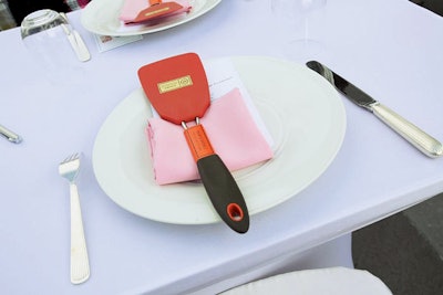 At the winter charity lunch in Miami benefiting the Moyer Foundation and the Mario Batali Foundation, each guest's place setting had a spatula with the Batali Foundation logo.