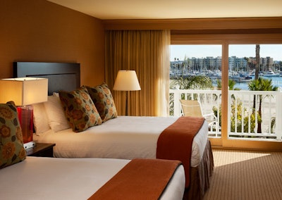 Guest rooms have private balconies and views.
