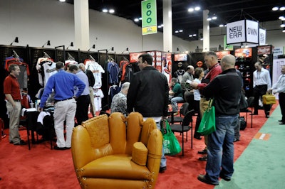 Rawlings Sporting Goods' exhibit included a variety of team apparel and equipment, and a chair resembling a baseball glove.