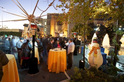 Guests mingled amid wintry decor and props.