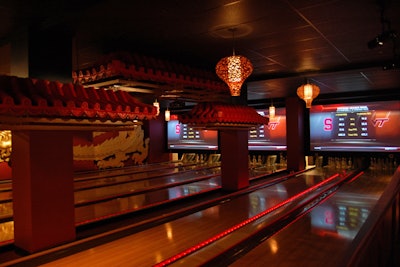 Red pagoda details and a large golden dragon mural form the look of the 100-person Chinatown lanes area.