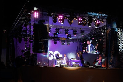 T-Pain was the headlining DJ atop a stage constructed over the Bud Light Hotel's courtyard entrance for GQ's Super Bowl party for nearly 1,400 people in South Beach.