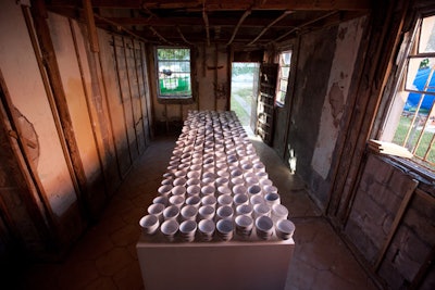 Upon entering the house, guests encountered a room with 1,000 small bowls.