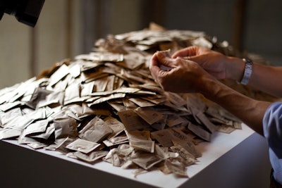 Rubell placed 4,000 brown-sugar packets in what used to be a bedroom.
