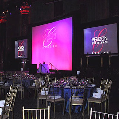 Screens set up with a small stage showed the Verizon Excellence awards logo and the award winners.