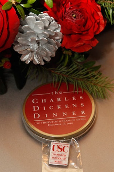 Table gifts included chocolate tins and lapel pins.