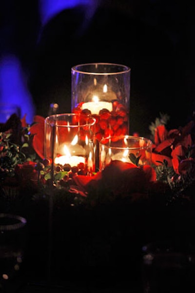 Pine needles and cranberries decked centerpieces.