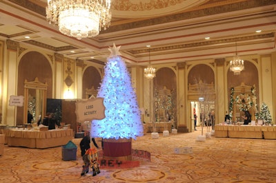 The cocktail reception took place in the State Ballroom, where a 12-foot-tall Christmas tree was made from recycled water bottles and LED lights.