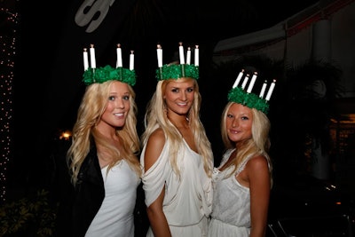 Scandinavian models, friends of Miceli's, greeted guests upon arrival, wearing lighted wreaths to represent Lucia, the Christian martyr after whom the holiday is named. The holiday is celebrated on December 13 with a procession and festival of lights to honor the saint, who was killed by the Romans around A.D. 300 because of her religious beliefs.