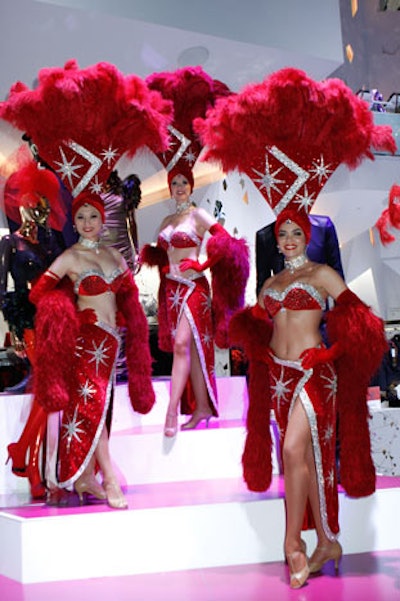Authentic Las Vegas showgirls, provided by Encore Productions, greeted guests as they entered the store.