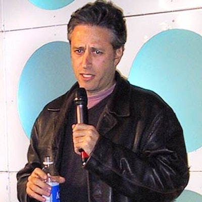 Jon Stewart (standing in front of Levy Lighting's color-changing chromo cube) was the host of Volvo's 75th anniversary party at Times Square Studios.