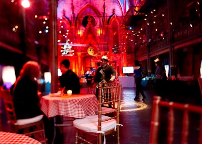 As a functional design element, event producer Miguel Calvo placed café tables dressed with checkered tablecloths in one section, allowing guests to sit while trying the different cocktails.