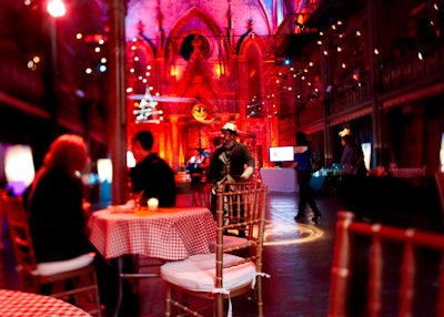 As a functional design element, event producer Miguel Calvo placed café tables dressed with checkered tablecloths in one section, allowing guests to sit while trying the different cocktails.