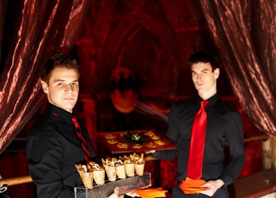 Waitstaff dressed to match the red-and-black Bacardi logo passed additional nibbles, including cones of yucca fries.