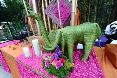 Food-station-top decor included colorful Asian linens and elephant decor pieces.