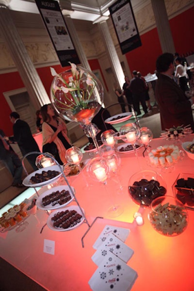 Two square frosted-glass dessert bars from Ridgewells Catering anchored each of the main-level atriums.