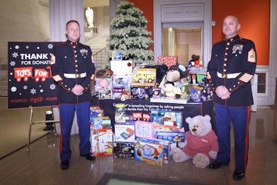 The party also had a charitable angle, with guests bringing unwrapped gifts for the Toys for Tots program.