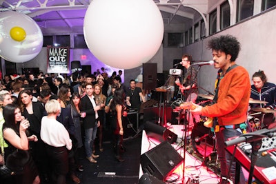 Live music came courtesy of the Twin Shadow band, who performed on a custom stage in the agency's main room.