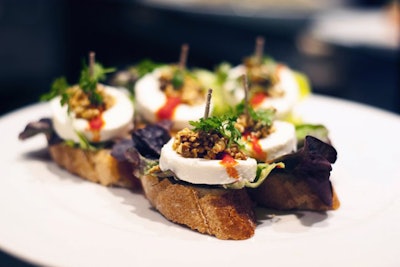 The menu at Le Rouge Wine Bar & Tapas includes a variety of crostini, such as goat cheese with black and green olive tapenade.