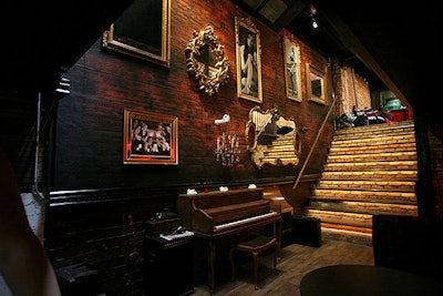 The exposed brick walls at Nu Visions in Photography are decorated with photographs taken by the venue's owners.