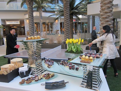 Guests channeled their inner kids with a ping-pong game behind a luxe dessert display at the New Year's Day brunch.
