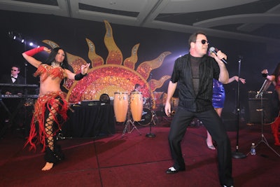 Before midnight, some of the dancers and other entertainers joined the band onstage.