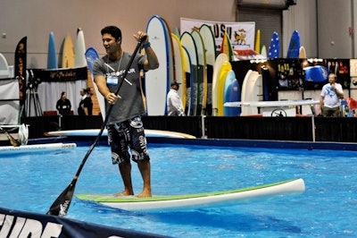 Step Up Productions created a 25- by 50-foot pool for stand-up paddle boarding demonstrations and lessons.