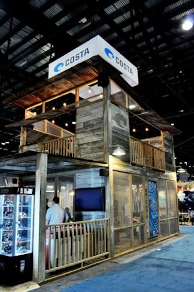 Costa sunglasses brought an authentic barn from West Virginia to use as its booth. The upstairs included televisions and lounge seating for sales representatives to conduct meetings.