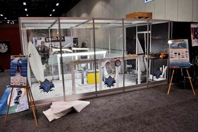 For the first time, Surf Expo created a glass-enclosed booth so competitors in the surfboard shape-off could work in full view of attendees.