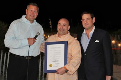 Shawn Garrity and Gary Cioffi of Union Square Agency joined Michael Gongora, vice mayor of Miami Beach, for a proclamation to change Ocean Drive's name to Orange Drive for the duration of the festival.