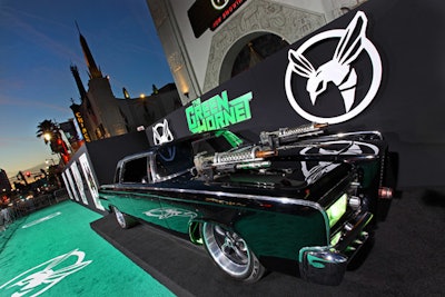 The Black Beauty prop car from The Green Hornet stood sentry for the green carpet arrivals for the movie's premiere.