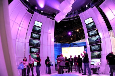 NBC Universal's exhibit was dominated by a 25-foot tall, 30-feet-in-diameter, white-sheathed globe that also served as a fully functional broadcast stage.