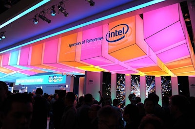 Intel's 12,000-square-foot booth included an enormous, front-facing LED screen and about 30 plasmas, all topped by a waved ceiling that changed colors to the pulsating beat of the exhibit's music.